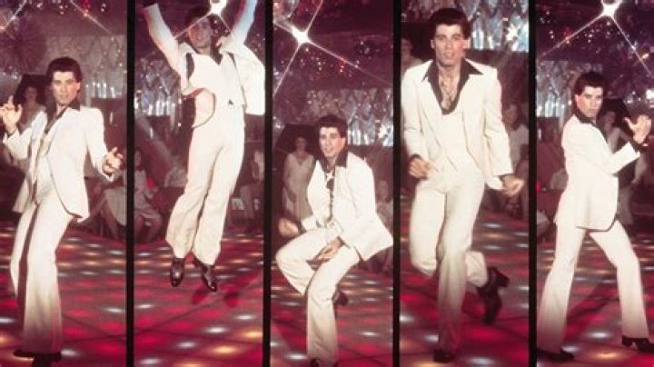 Did John Travolta do his own singing in Grease