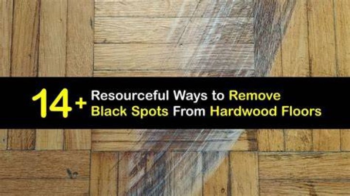 How do you get black tar off hardwood floors
