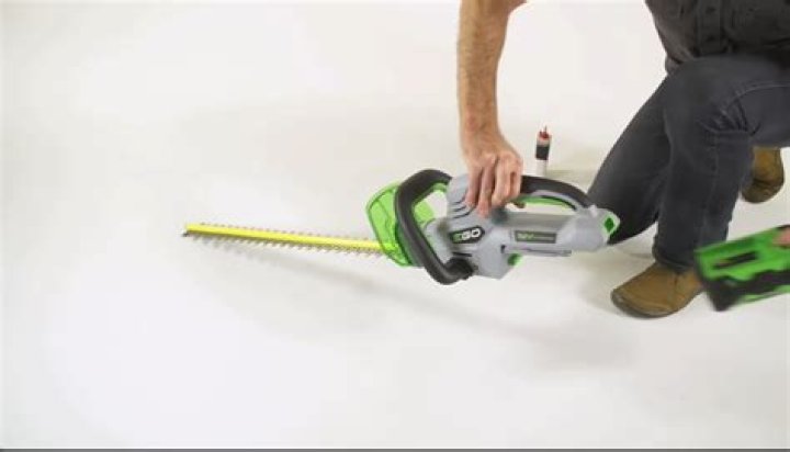 How do you lubricate an electric hedge trimmer