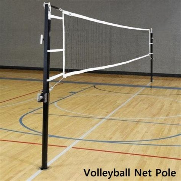 How far apart are volleyball poles