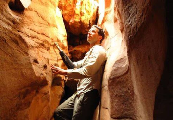 How long did it take Aron Ralston to cut his arm off