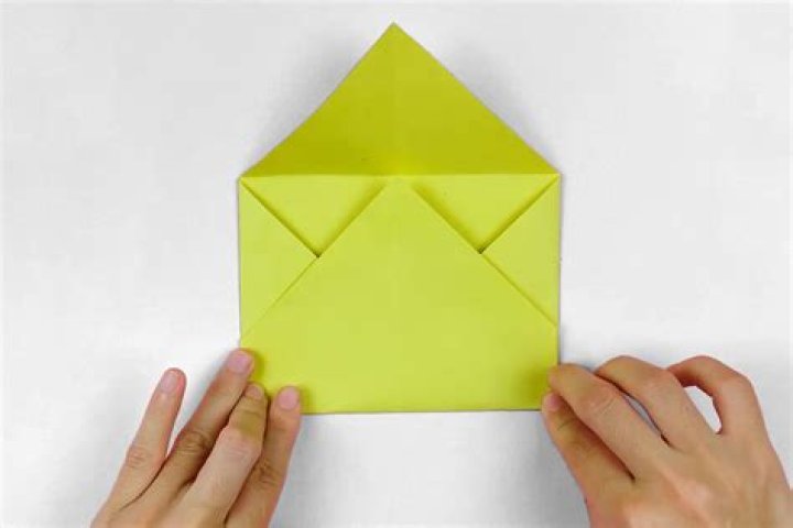 How much do 4 sheets of paper and an envelope weigh