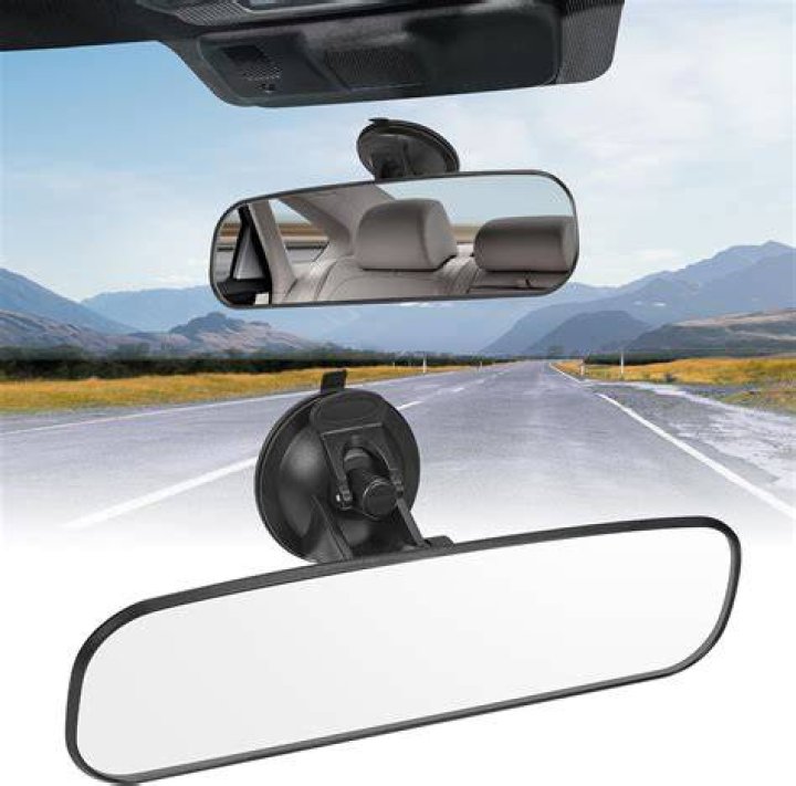 What do the buttons on the rear view mirror do