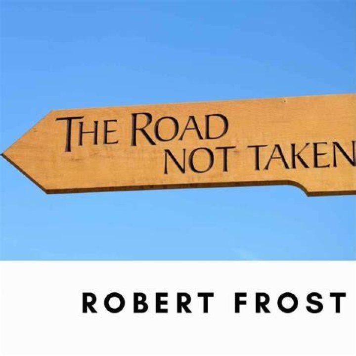 What is the tone of Robert Frost The Road Not Taken